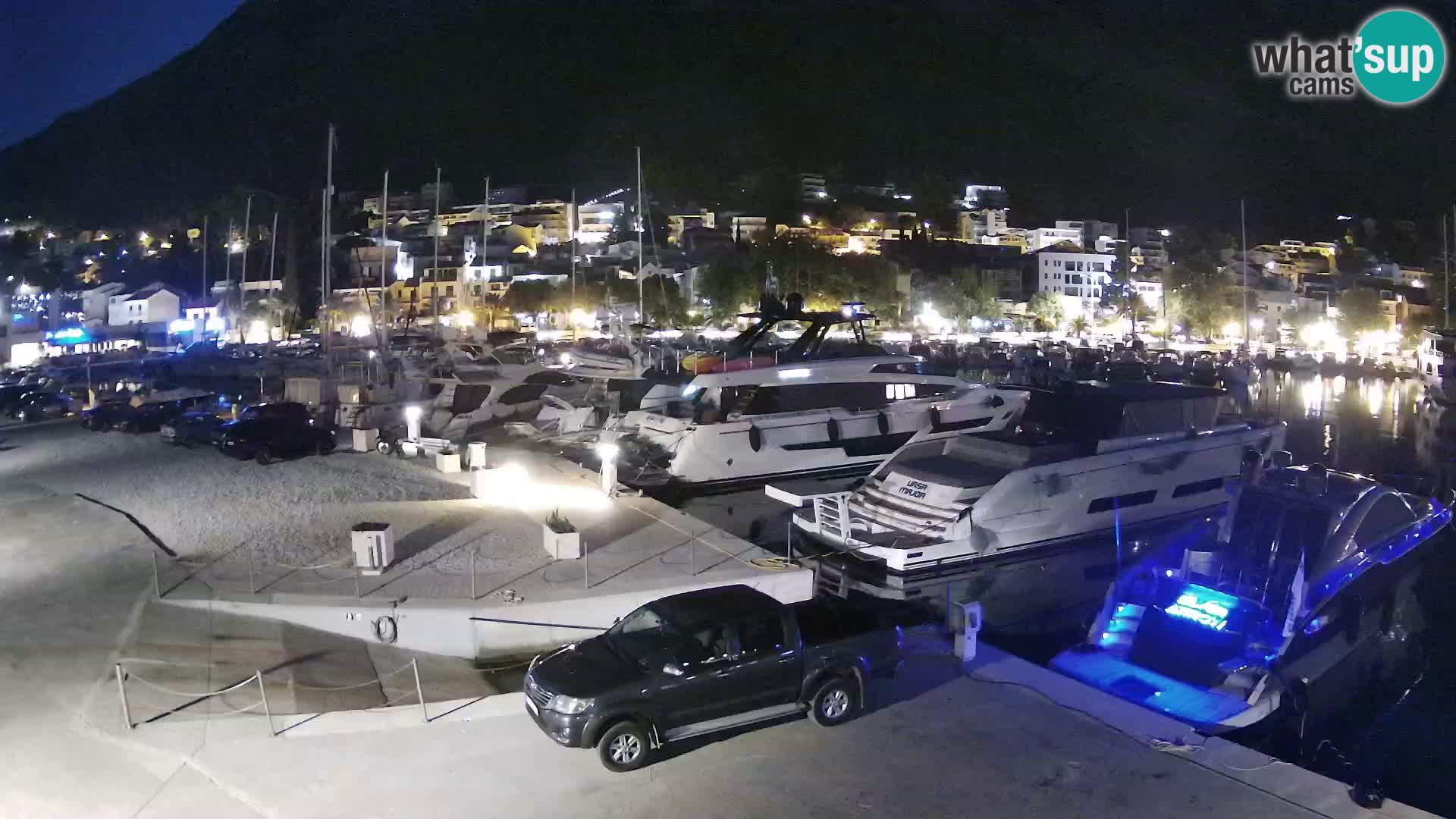 Webcam Basca Voda –  Vista desde el puerto deportivo de la ciudad y la montaña Biokovo