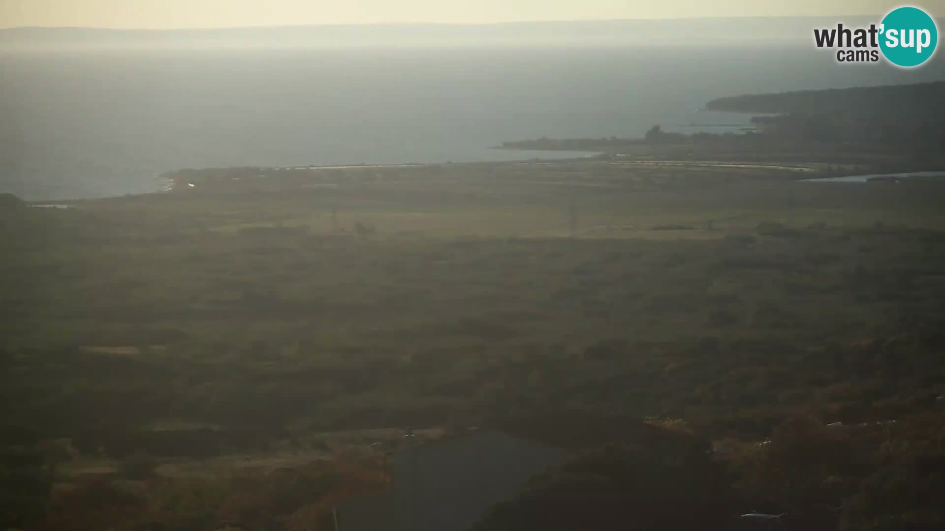 Pogled s Sirarne Gligora na Kolansko polje, blato in ornitološki rezervat