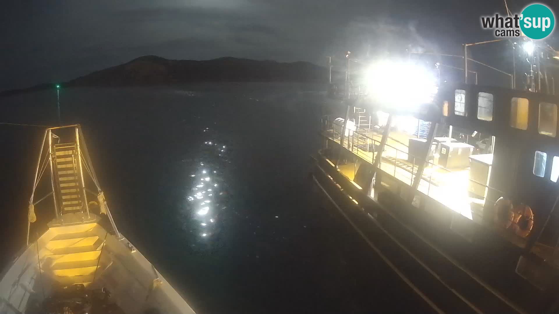 Čoln Lo Squalo IV – arhipelag spletna kamera La Maddalena – Sardinija – Italija