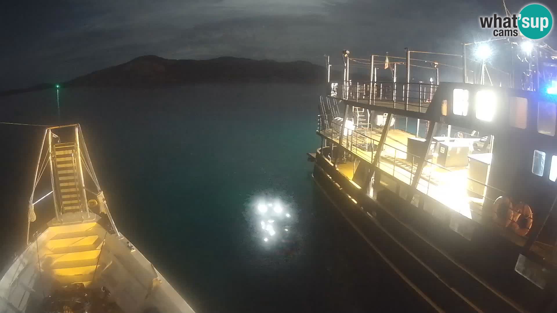 Čoln Lo Squalo IV – arhipelag spletna kamera La Maddalena – Sardinija – Italija