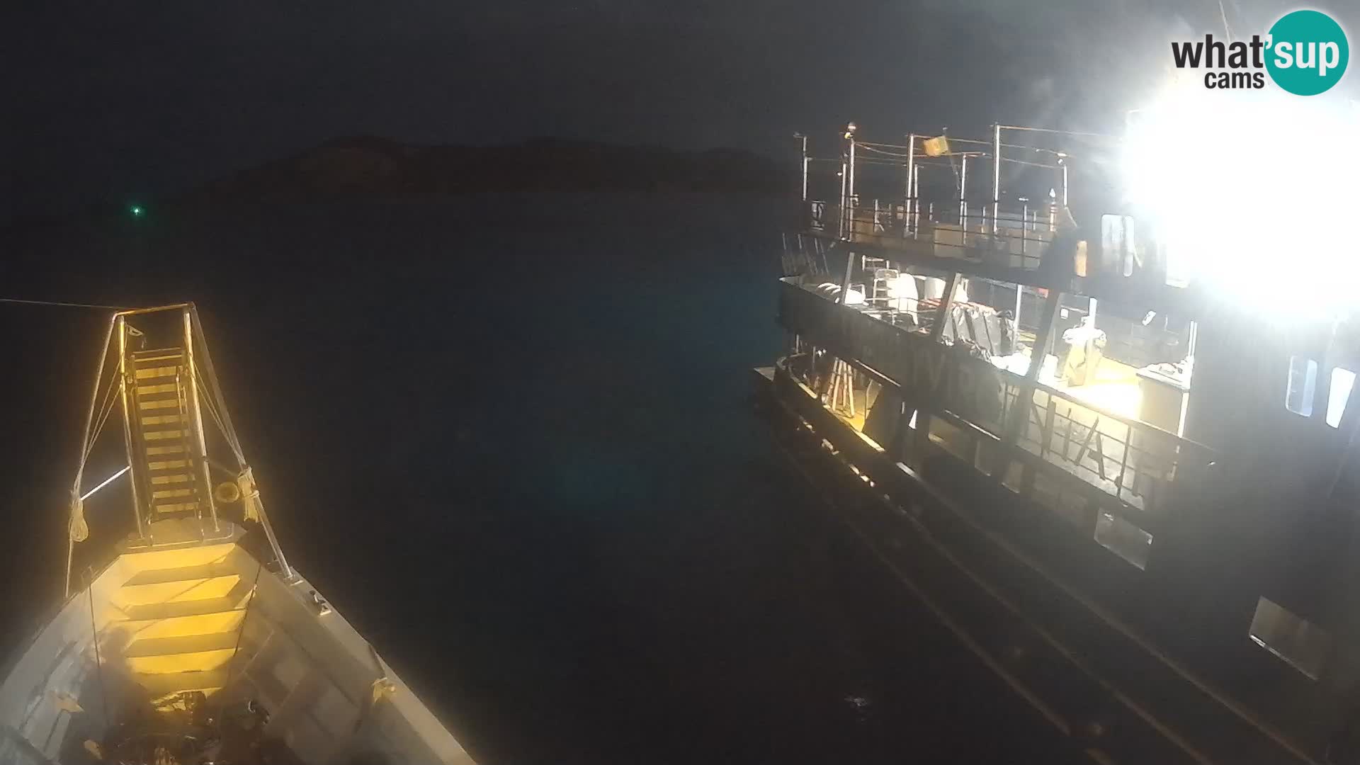 Čoln Lo Squalo IV – arhipelag spletna kamera La Maddalena – Sardinija – Italija