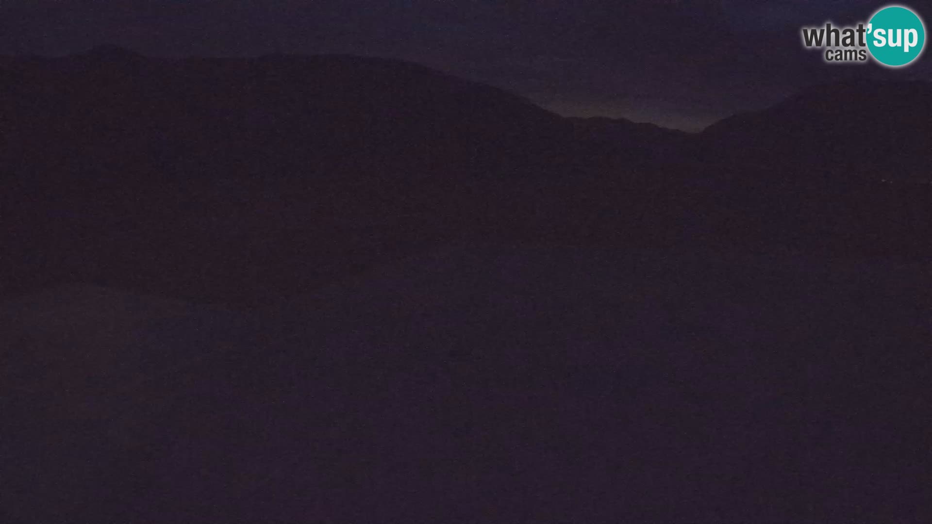 Webcam aereoporto di Bovec (Plezzo) – Vista verso il Kanin
