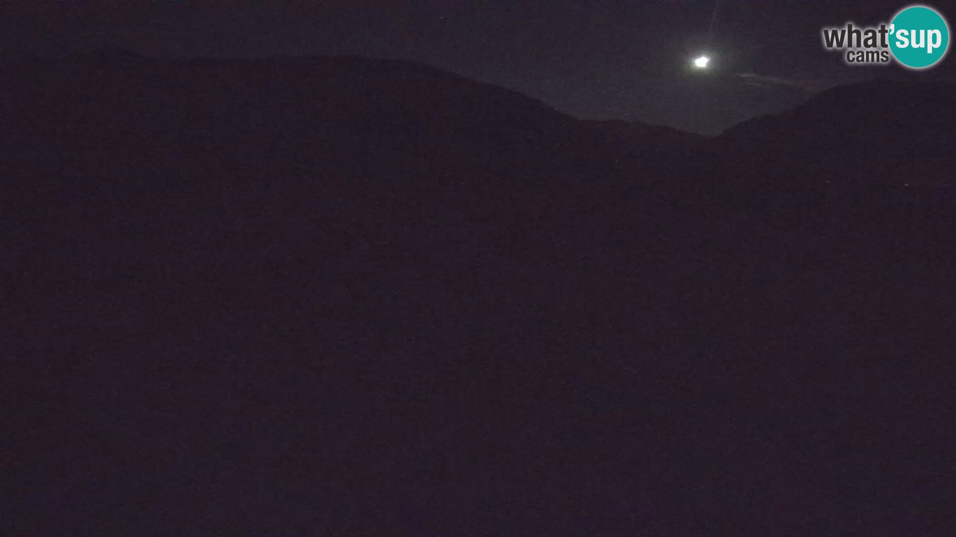 Webcam aereoporto di Bovec (Plezzo) – Vista verso il Kanin
