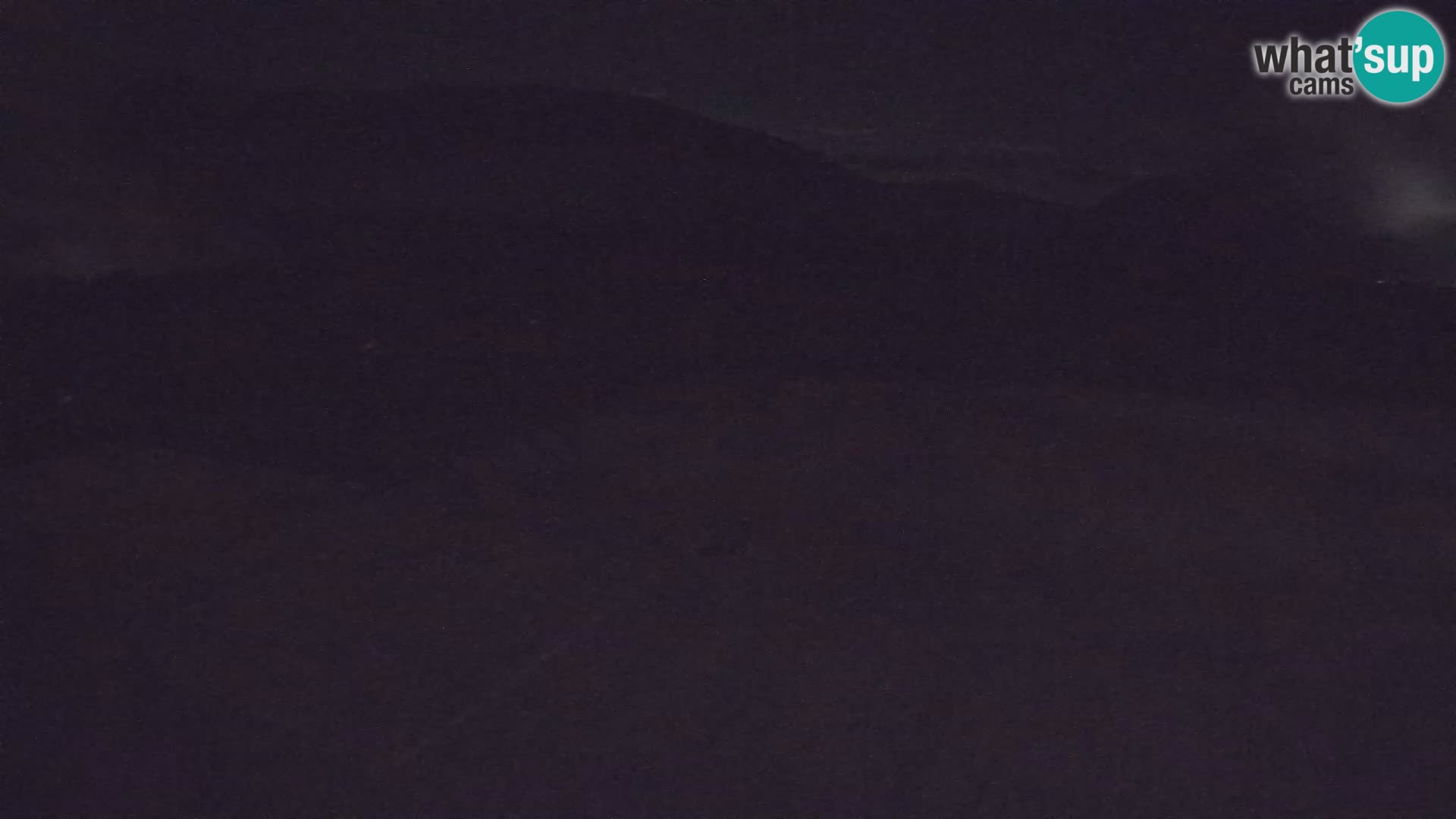 Webcam aereoporto di Bovec (Plezzo) – Vista verso il Kanin