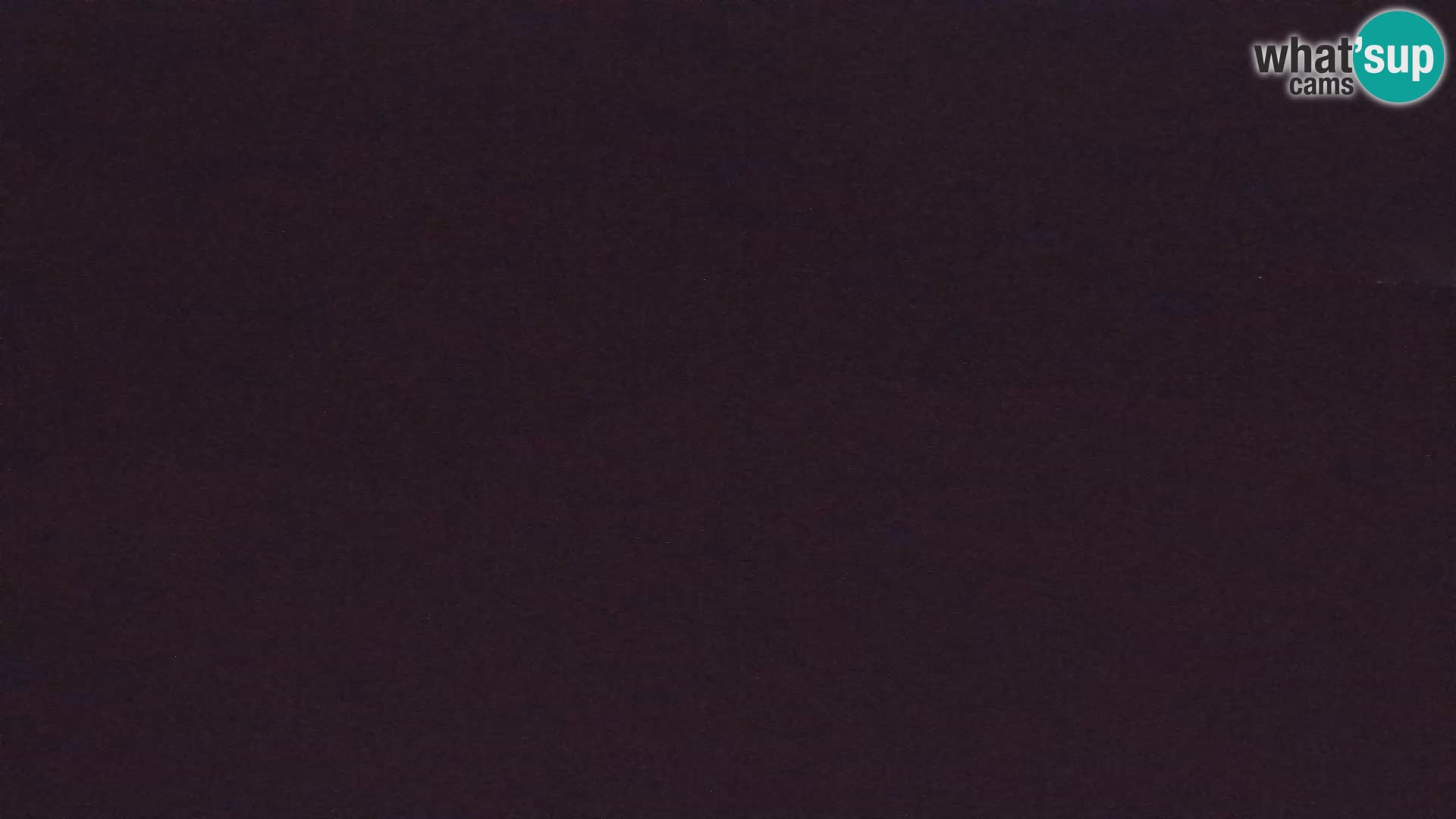 Webcam aereoporto di Bovec (Plezzo) – Vista verso il Kanin