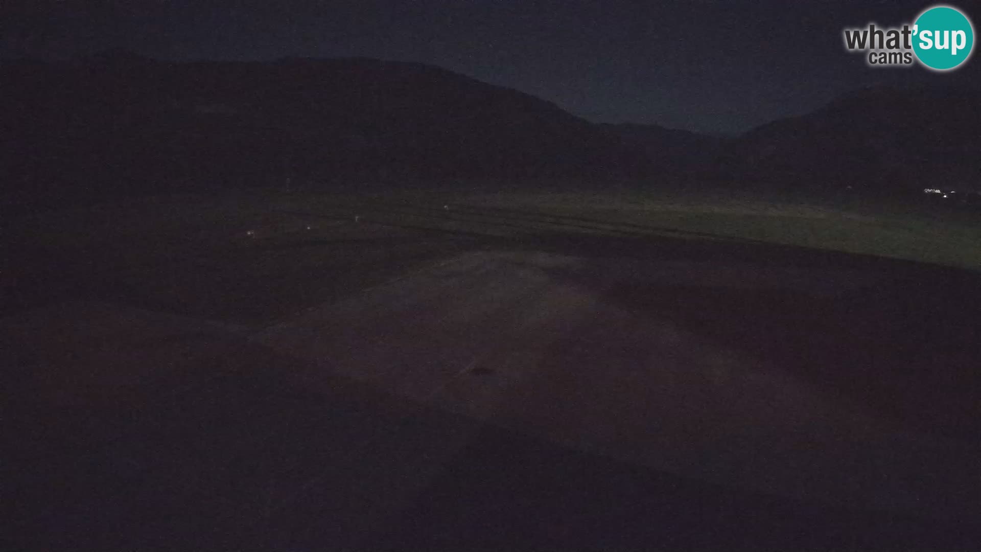 Webcam aereoporto di Bovec (Plezzo) – Vista verso il Kanin