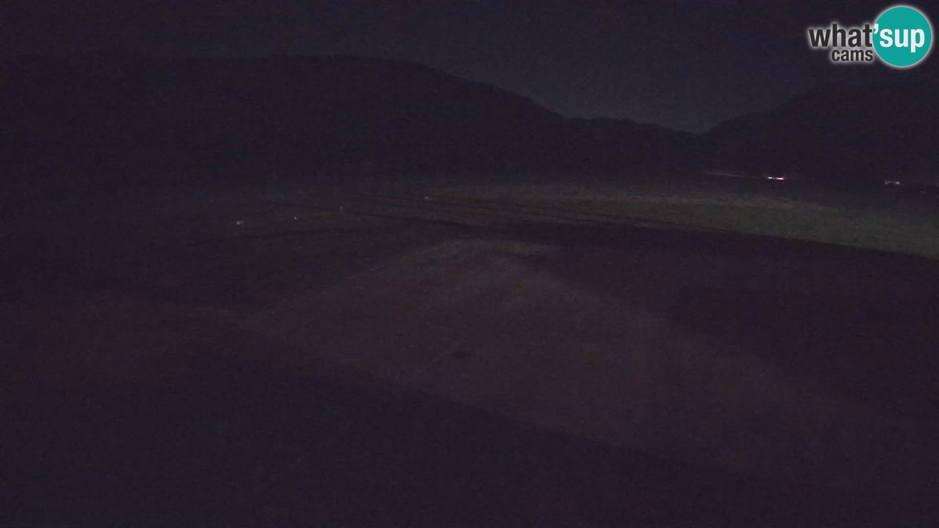 Webcam aereoporto di Bovec (Plezzo) – Vista verso il Kanin