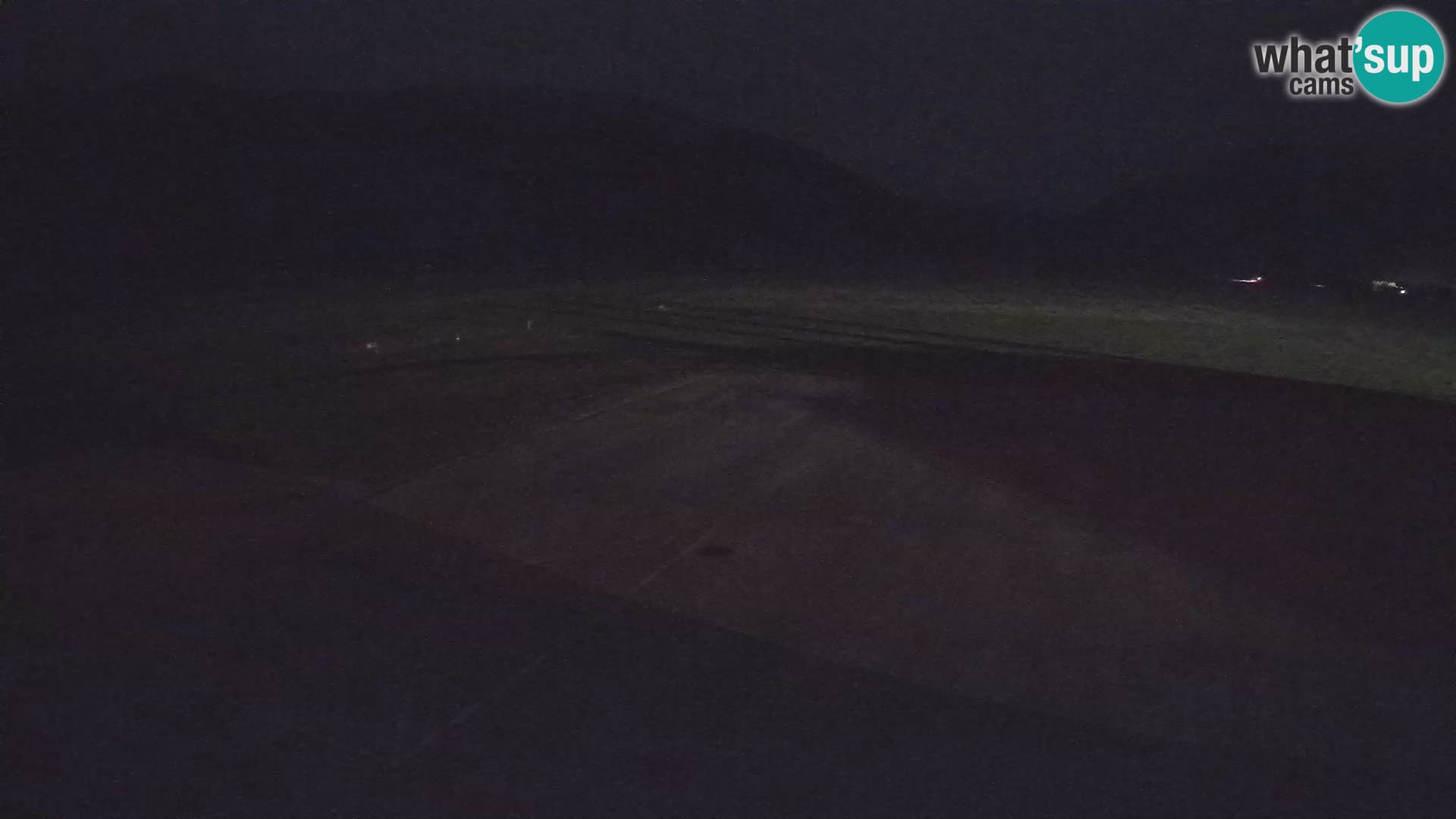 Webcam aereoporto di Bovec (Plezzo) – Vista verso il Kanin