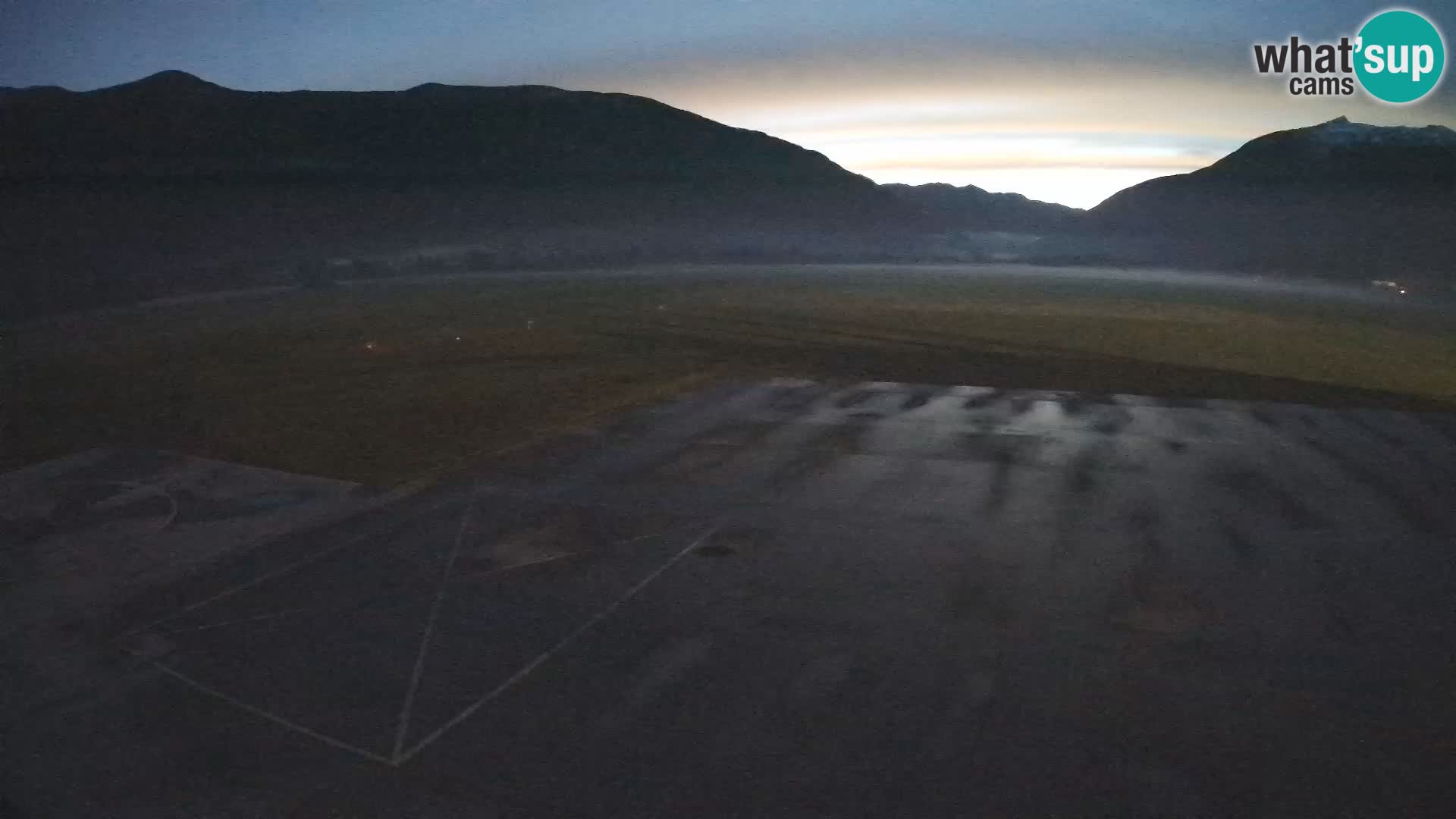 Webcam aereoporto di Bovec (Plezzo) – Vista verso il Kanin