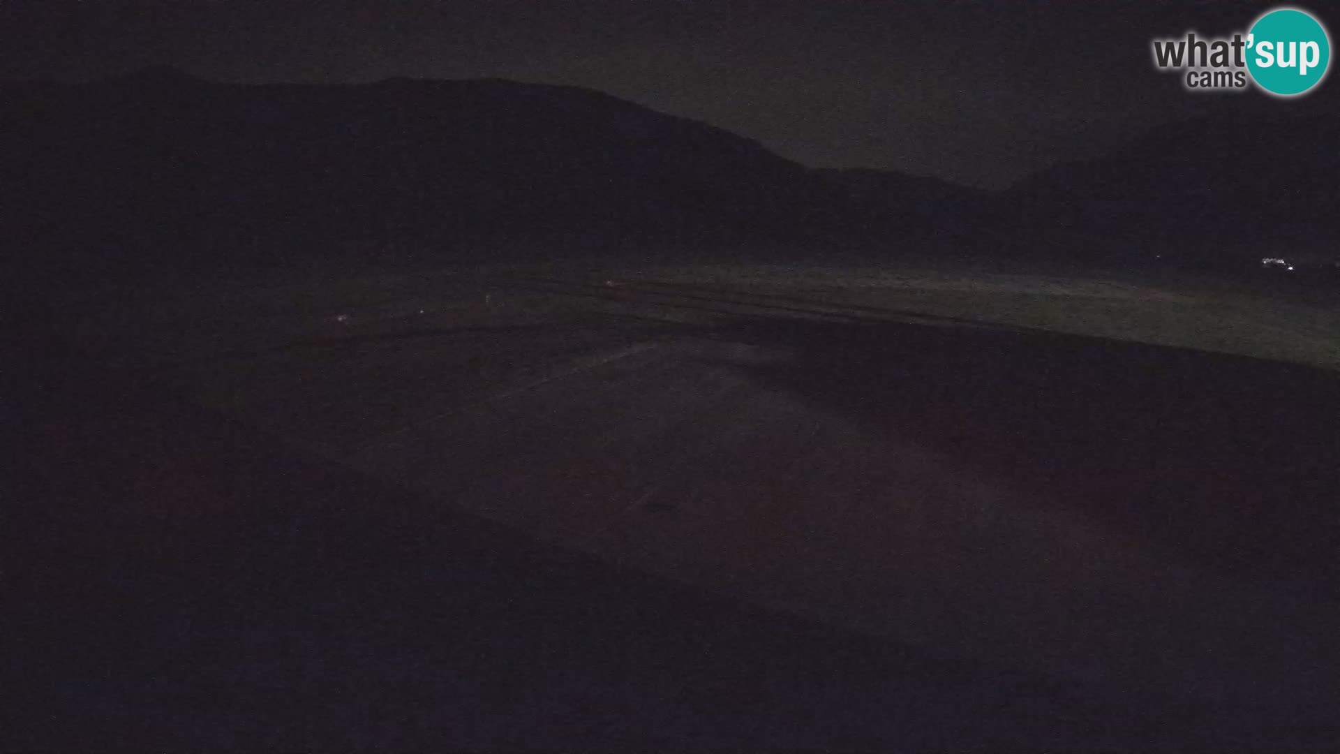 Webcam aereoporto di Bovec (Plezzo) – Vista verso il Kanin