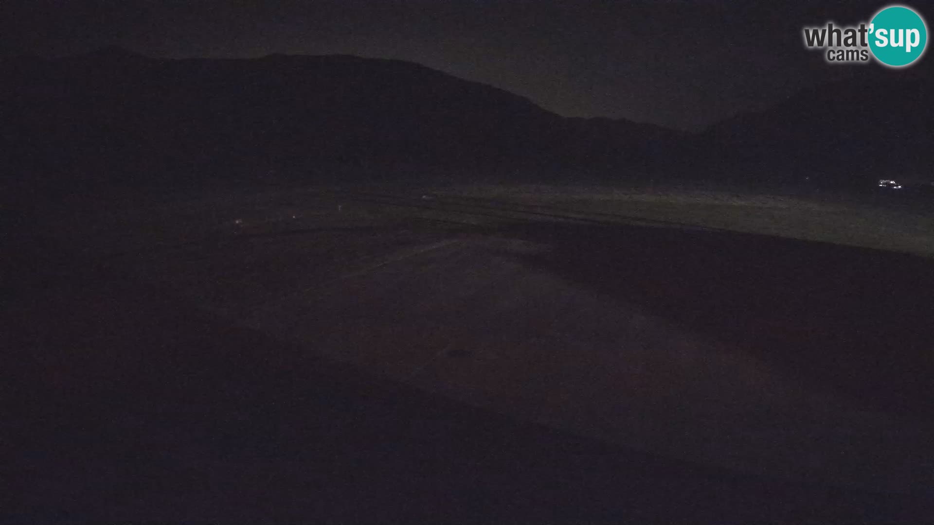 Webcam aereoporto di Bovec (Plezzo) – Vista verso il Kanin
