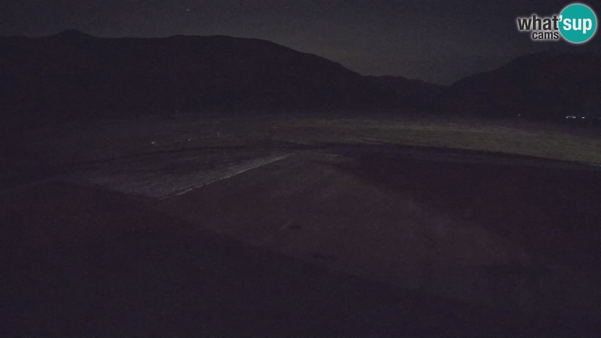 Webcam aereoporto di Bovec (Plezzo) – Vista verso il Kanin