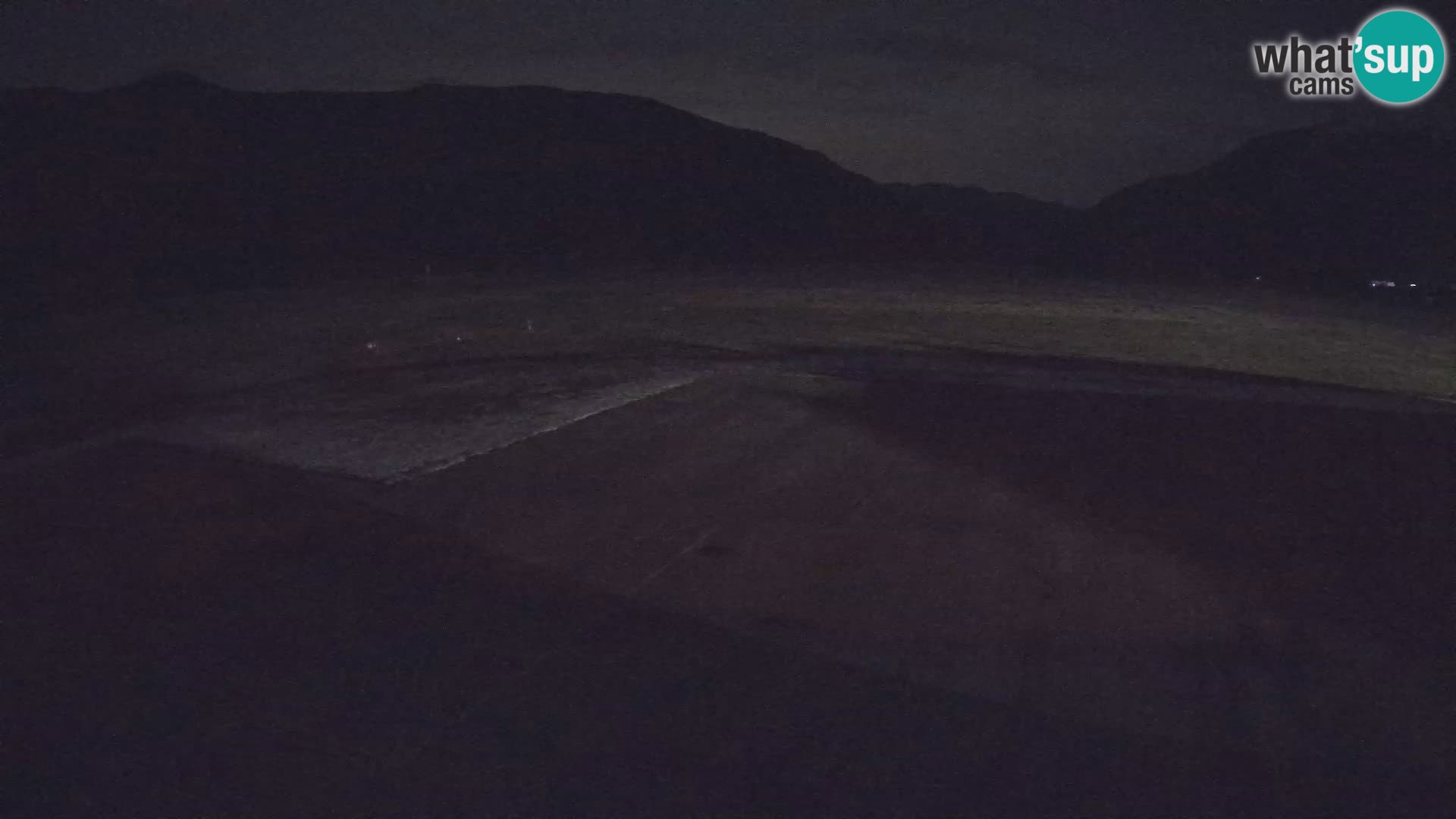 Webcam aereoporto di Bovec (Plezzo) – Vista verso il Kanin