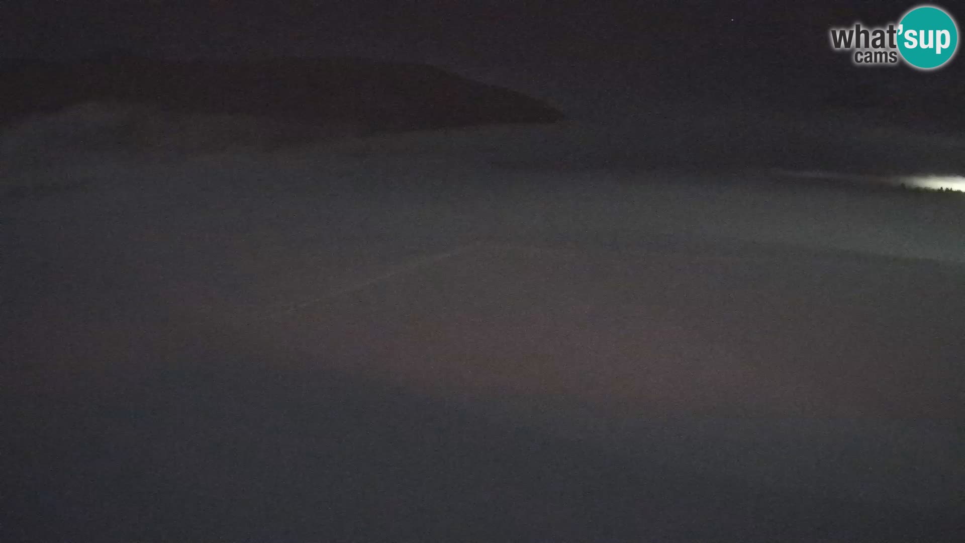 Webcam aereoporto di Bovec (Plezzo) – Vista verso il Kanin