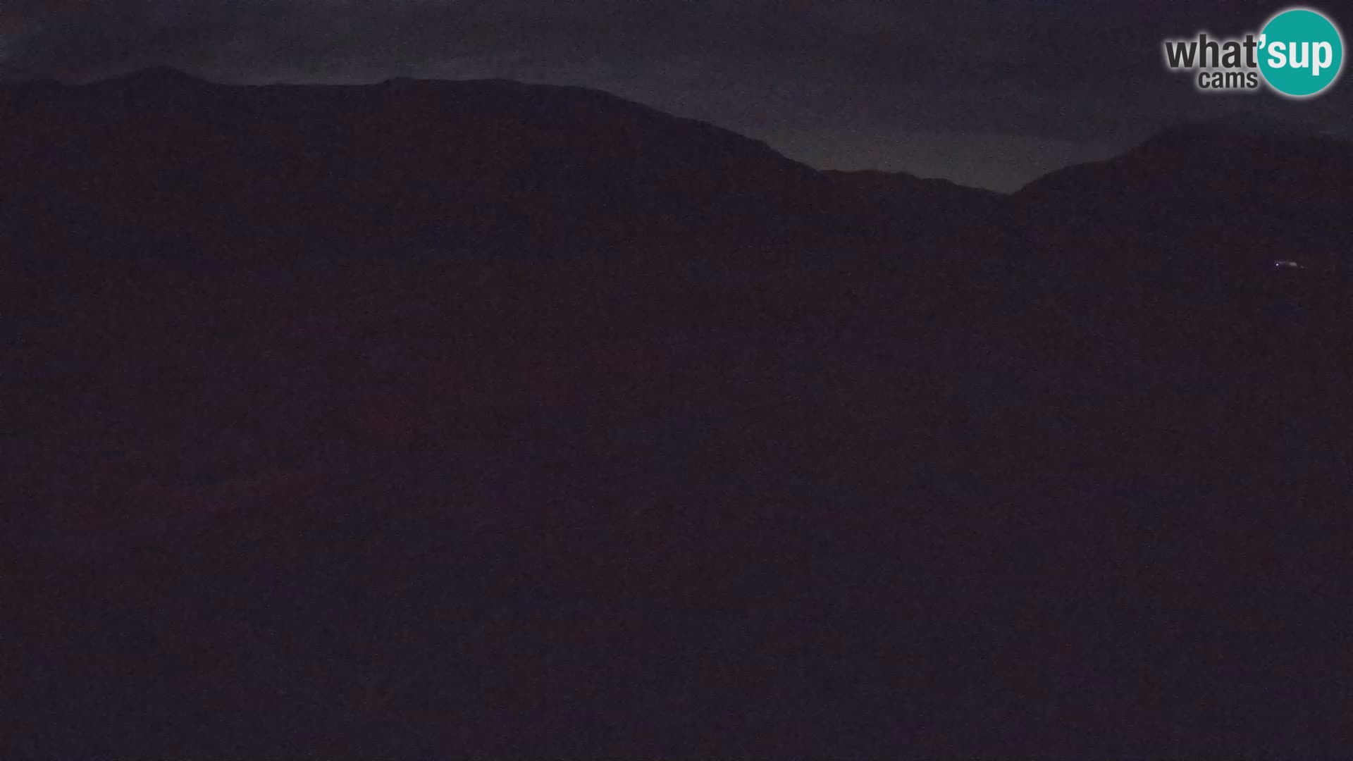 Webcam aereoporto di Bovec (Plezzo) – Vista verso il Kanin