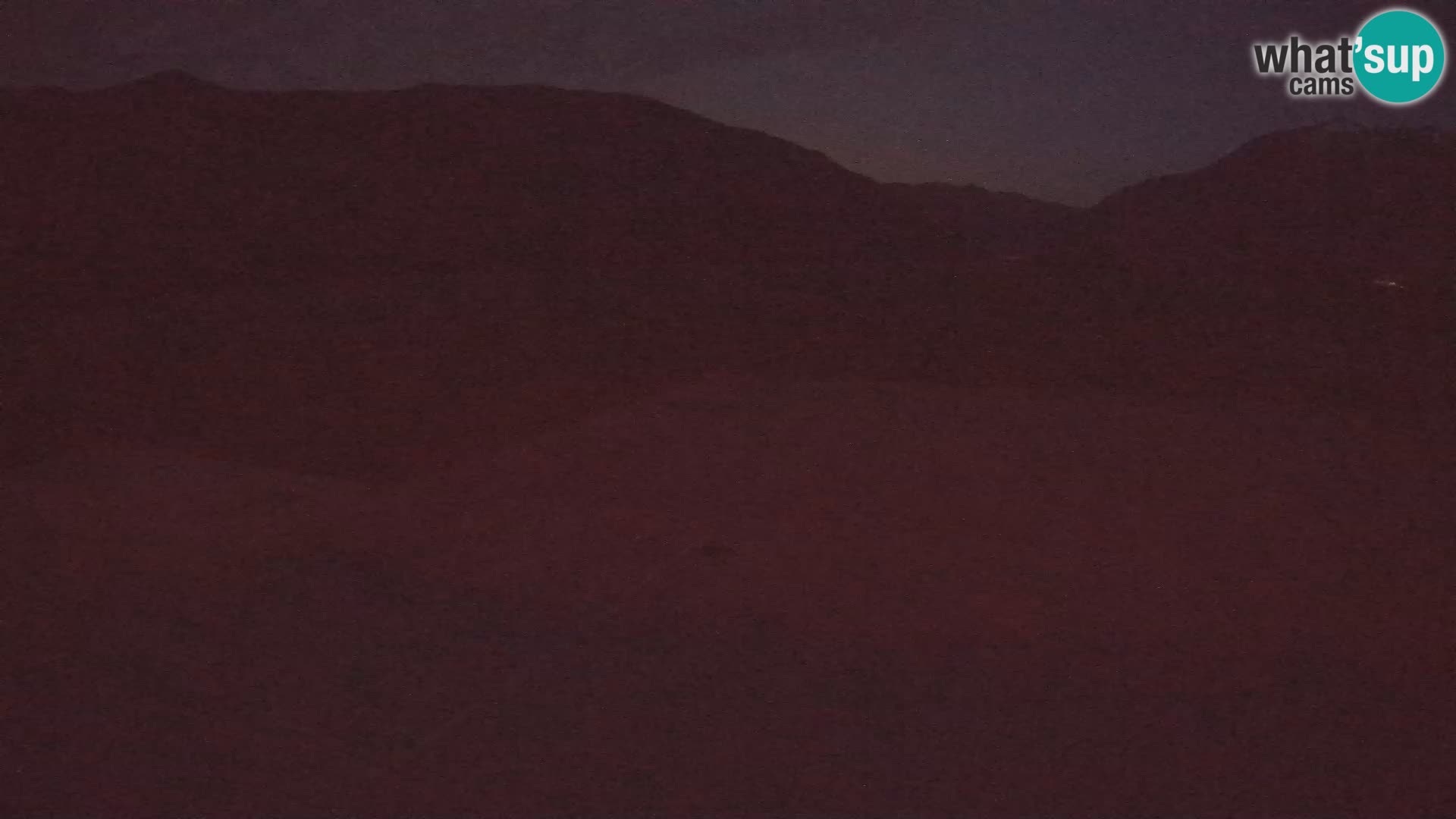 Webcam aereoporto di Bovec (Plezzo) – Vista verso il Kanin