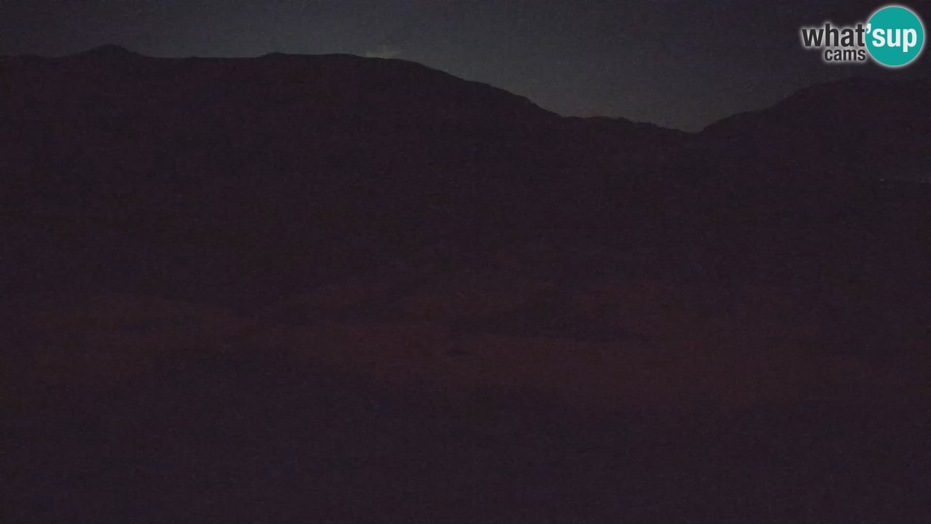 Webcam aereoporto di Bovec (Plezzo) – Vista verso il Kanin