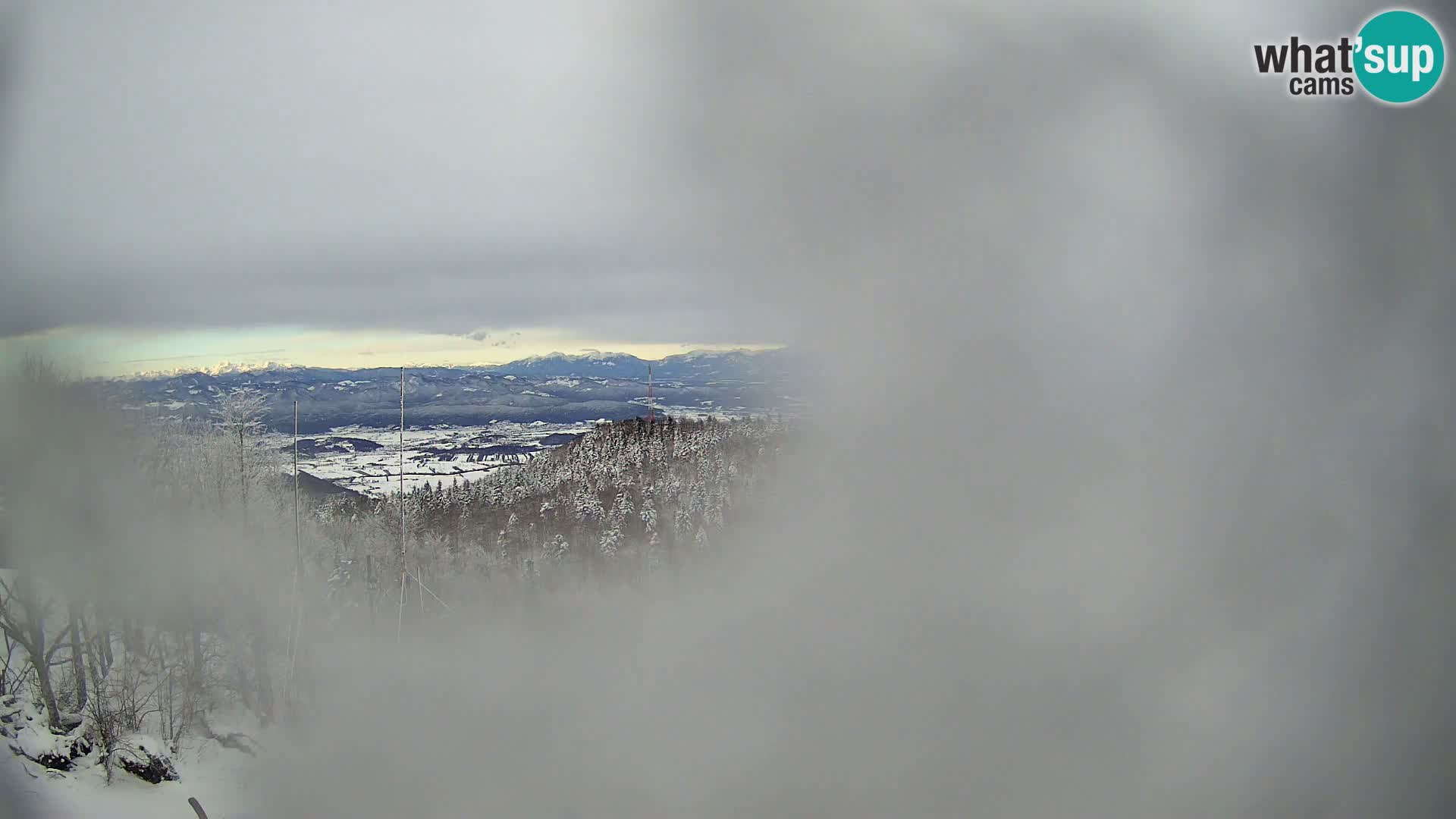 Krim webcam mountain hut | view to Ljubljana – Slovenia