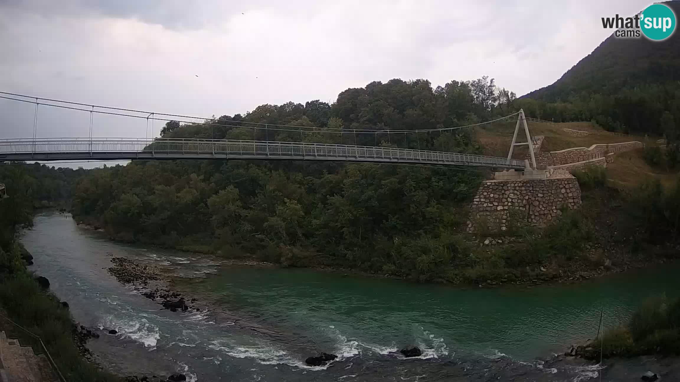 Fußgängerbrücke auf der Soča fluss Webcam Solkan