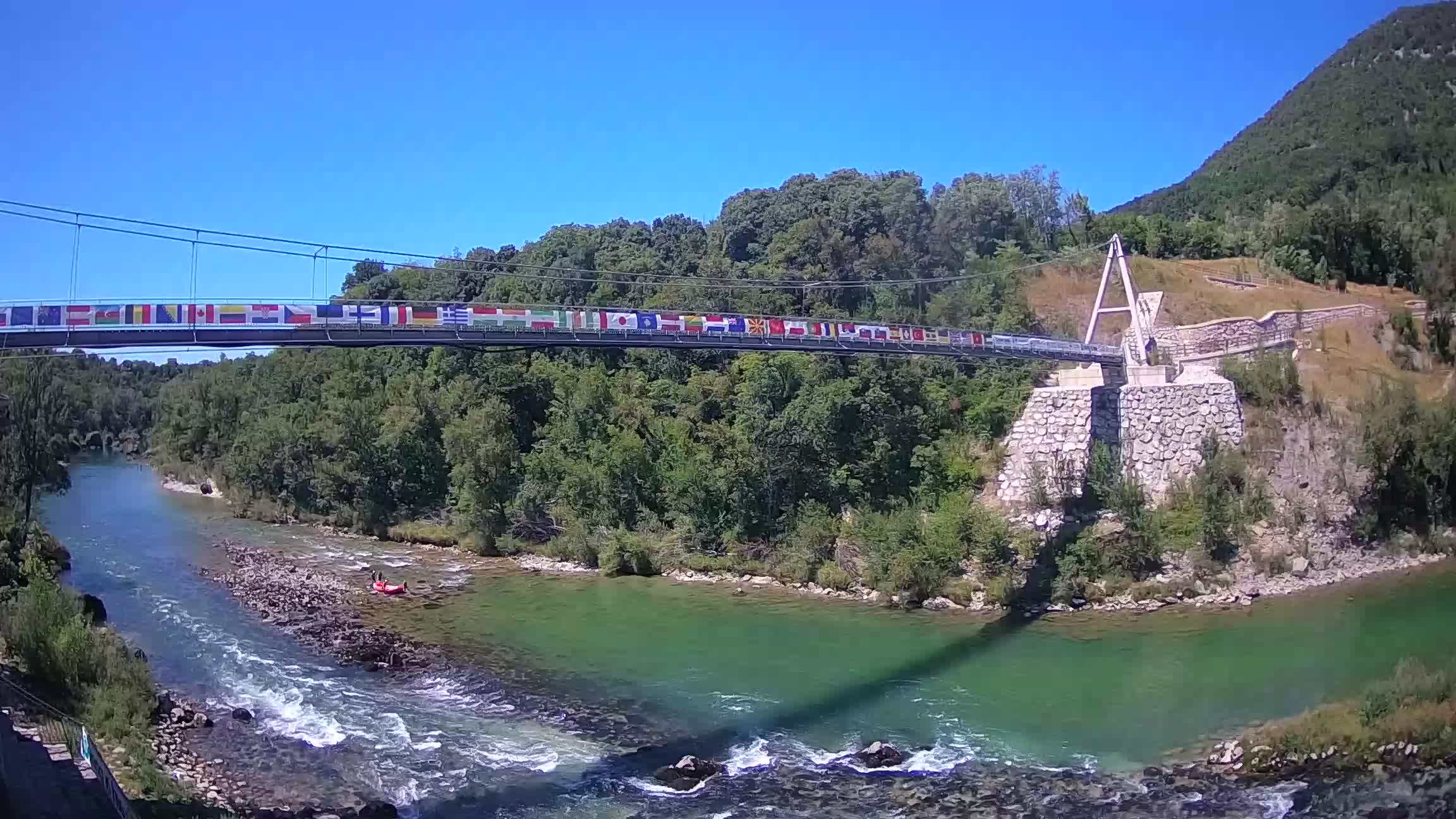 Fußgängerbrücke auf der Soča fluss Webcam Solkan