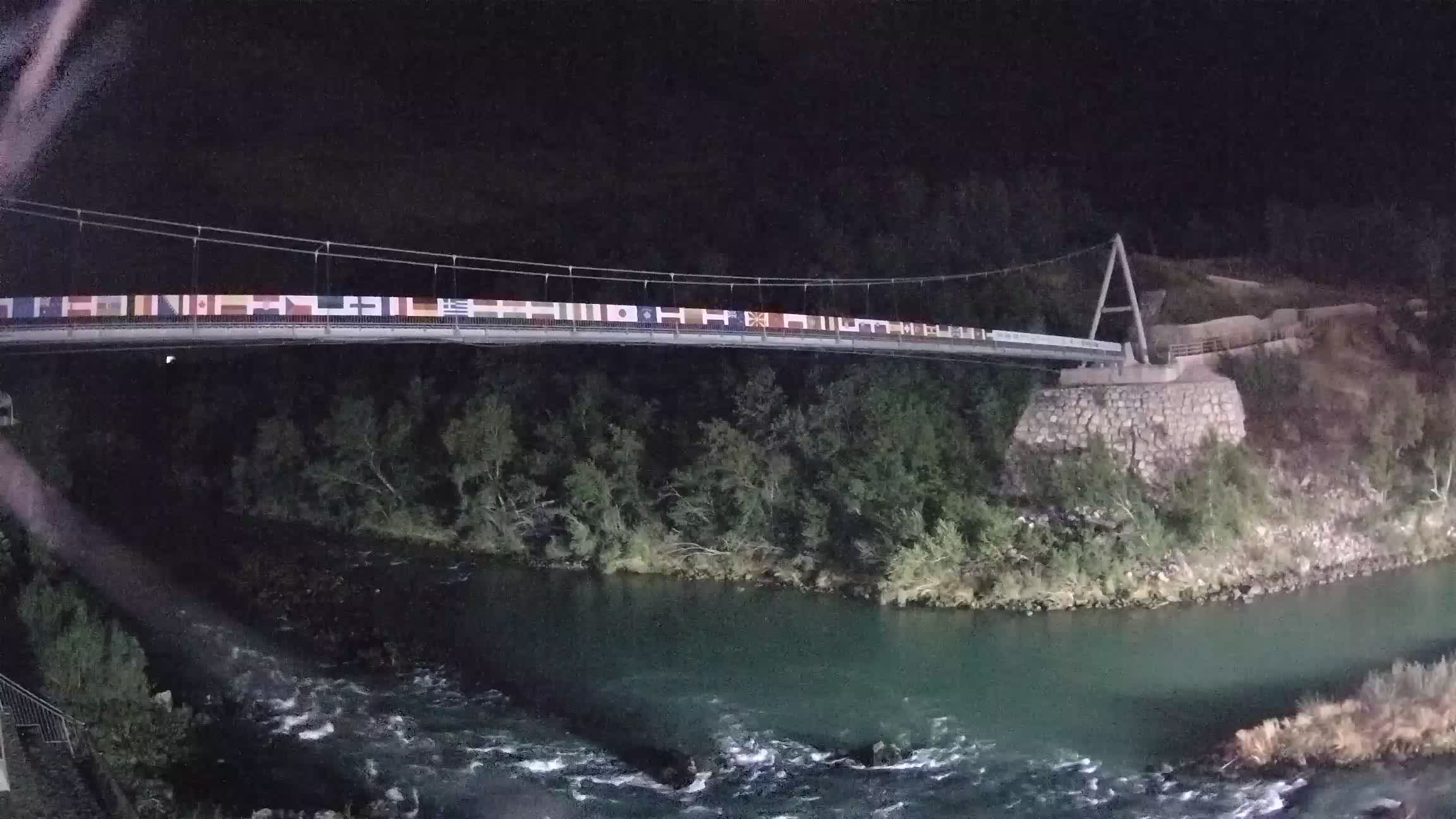 Fußgängerbrücke auf der Soča fluss Webcam Solkan