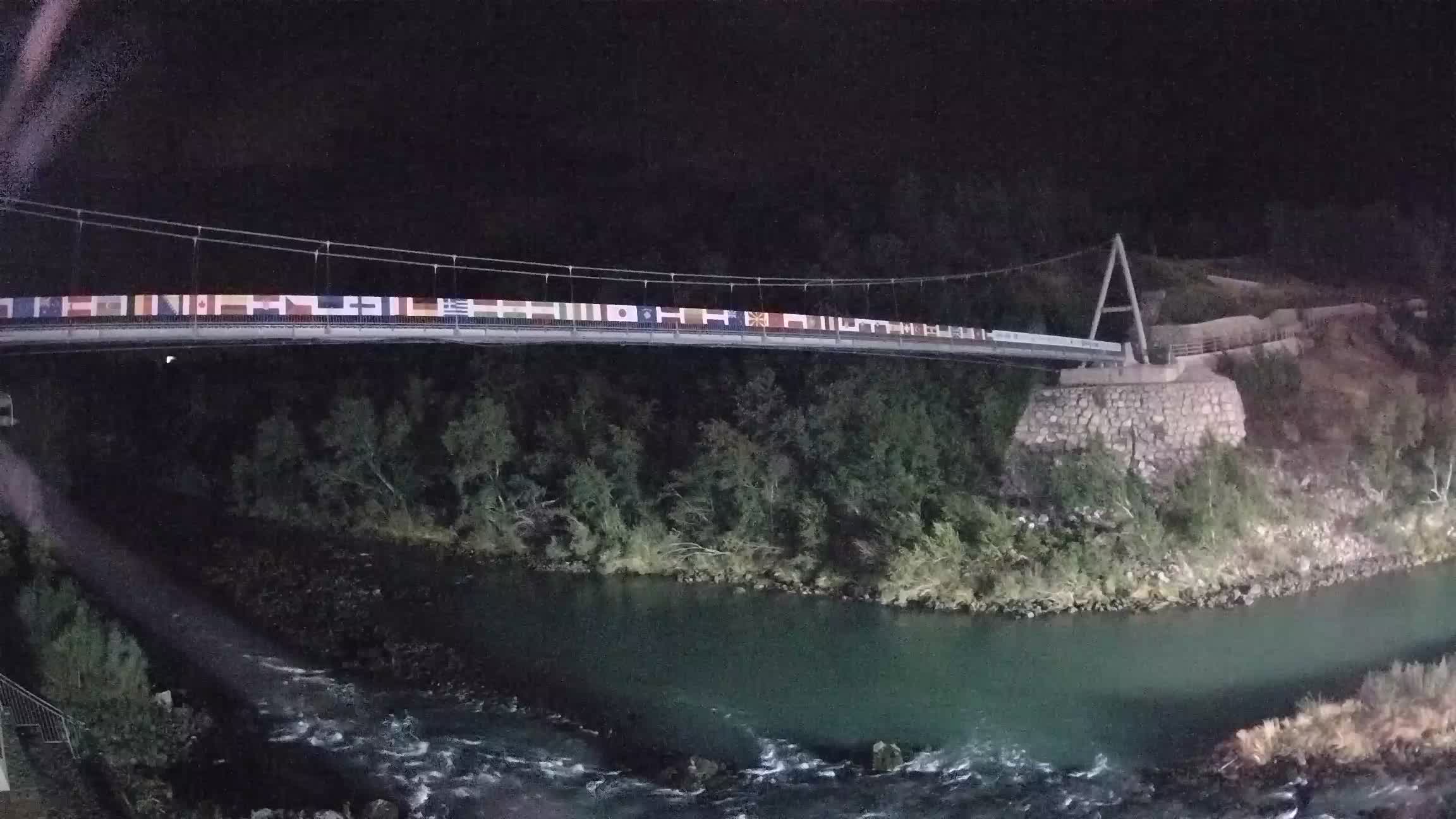 Fußgängerbrücke auf der Soča fluss Webcam Solkan