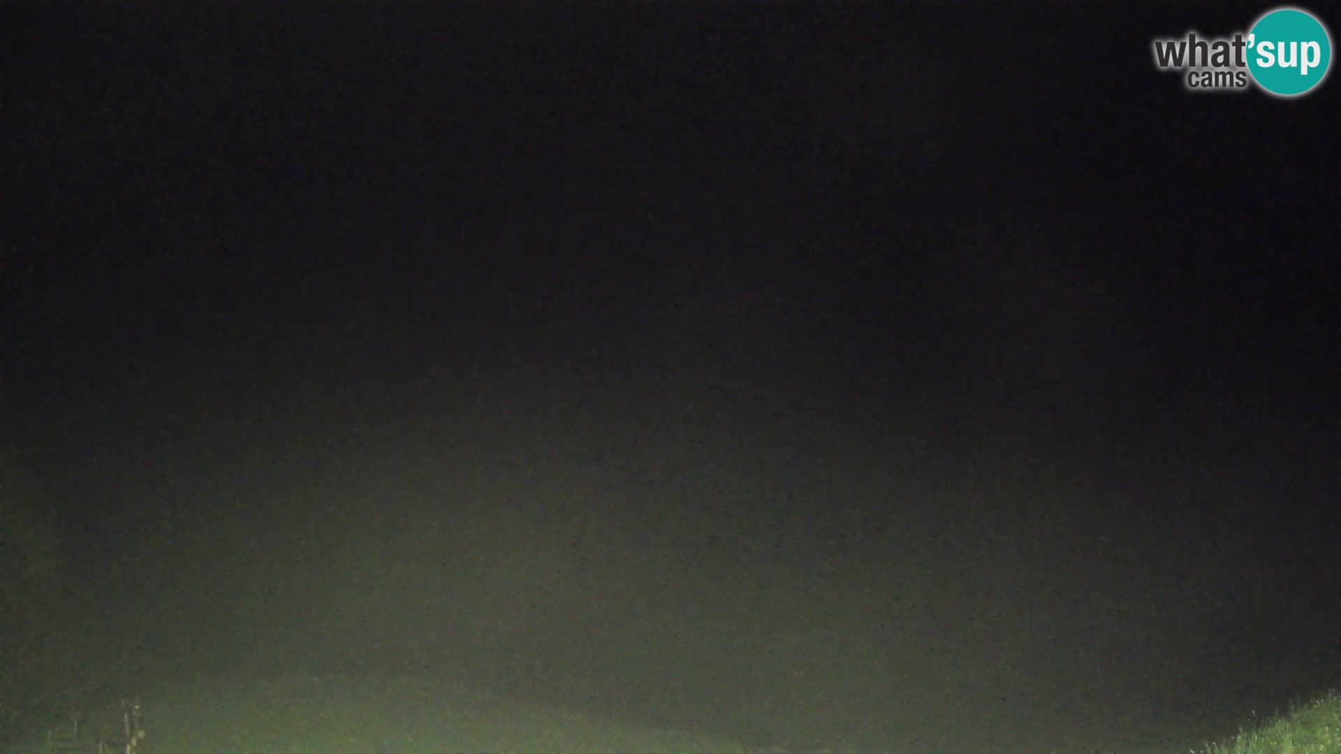 Webcam Brunarica Dražgoše – Vista live sul Ratitovec (1666 m)