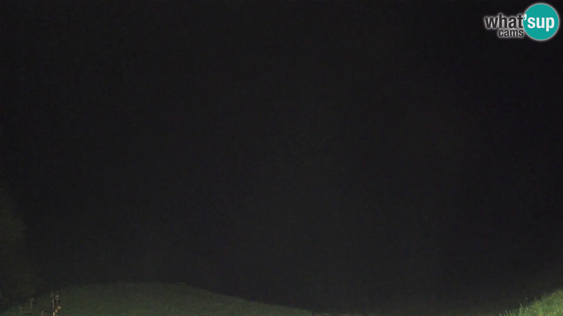 Webcam Brunarica Dražgoše – Liveblick auf Ratitovec (1666 m)