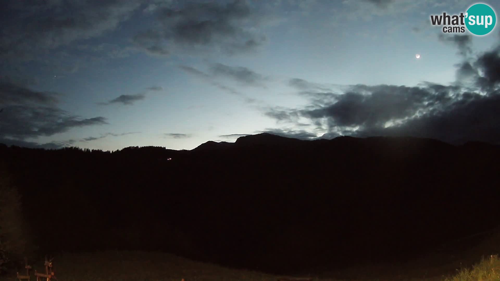 Webcam Brunarica Dražgoše – Vista live sul Ratitovec (1666 m)