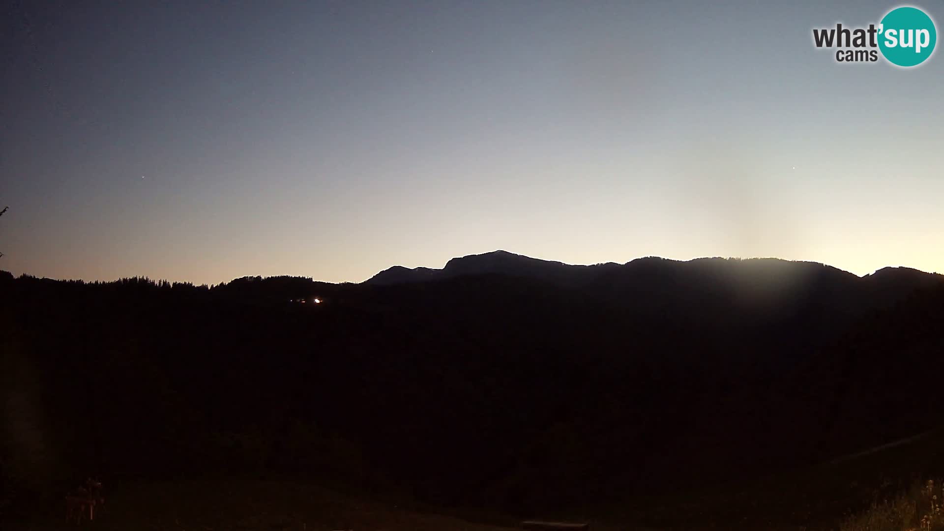 Webcam Brunarica Dražgoše – Liveblick auf Ratitovec (1666 m)