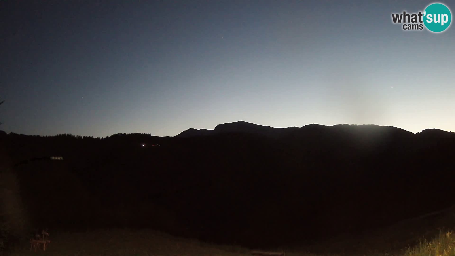 Webcam Brunarica Dražgoše – Vista live sul Ratitovec (1666 m)