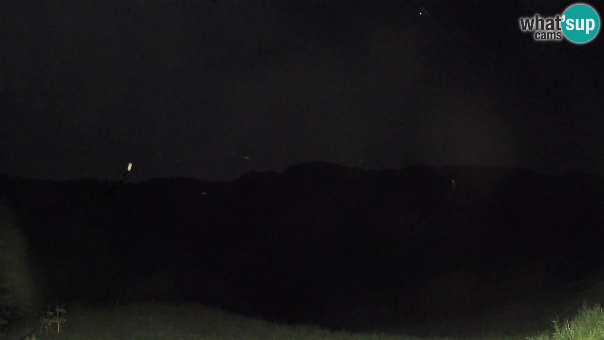 Webcam Brunarica Dražgoše – Vista live sul Ratitovec (1666 m)