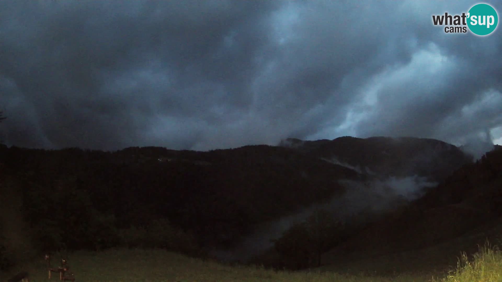 Webcam Brunarica Dražgoše – Liveblick auf Ratitovec (1666 m)