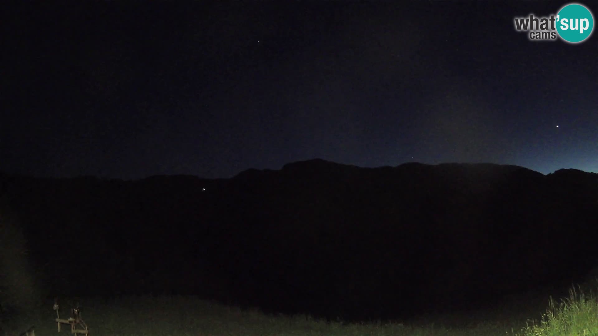 Webcam Brunarica Dražgoše – Liveblick auf Ratitovec (1666 m)