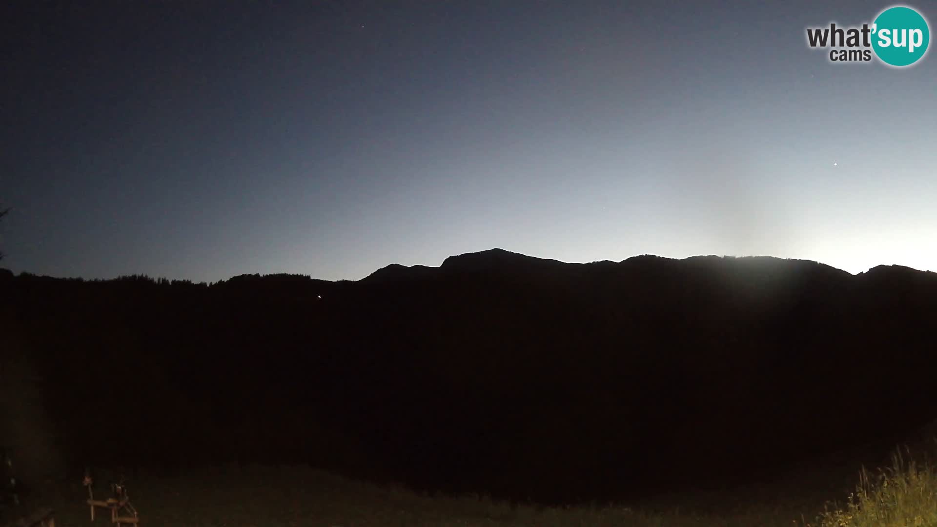 Webcam Brunarica Dražgoše – Vista live sul Ratitovec (1666 m)