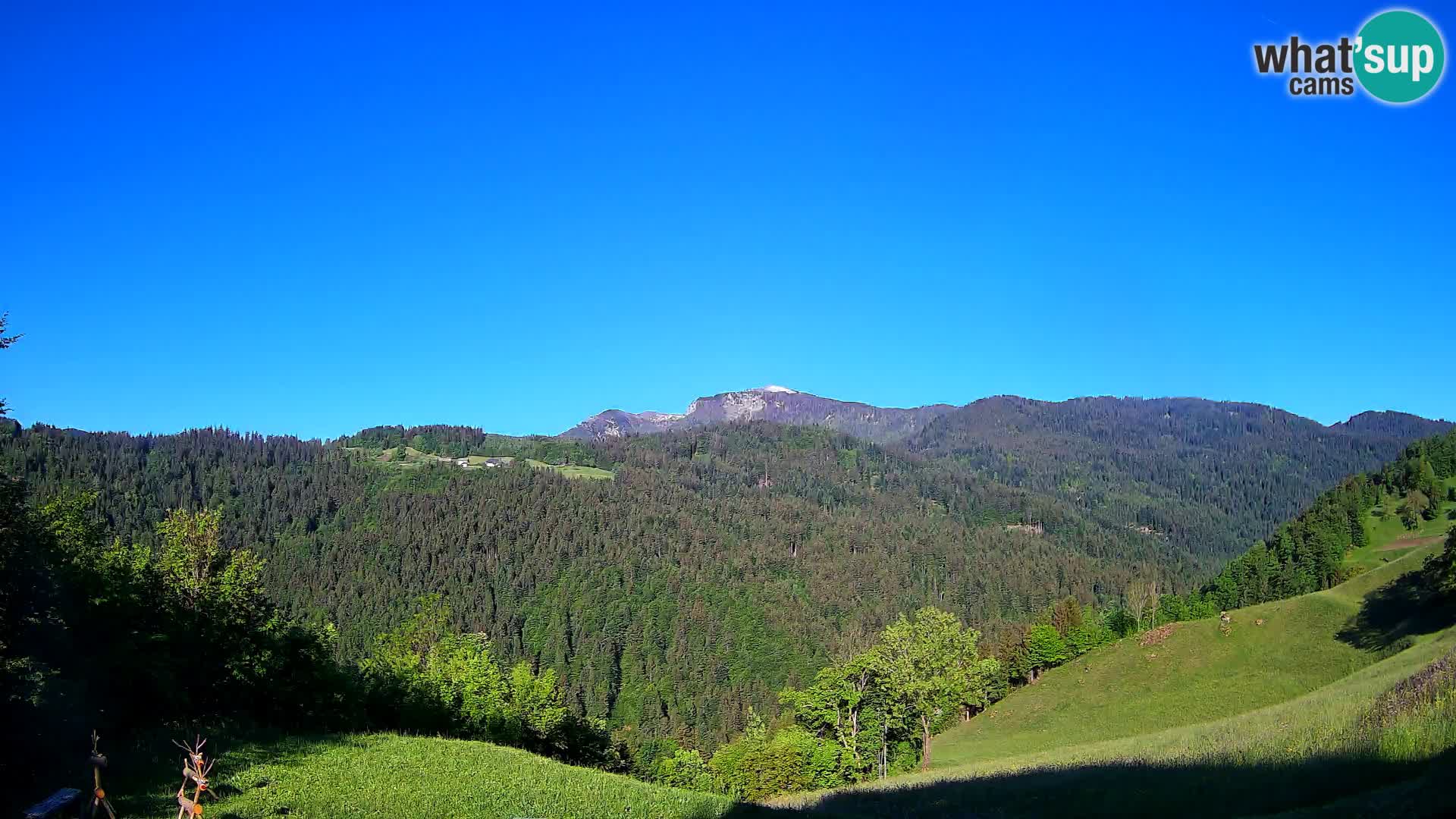 Webcam Brunarica Dražgoše – Liveblick auf Ratitovec (1666 m)